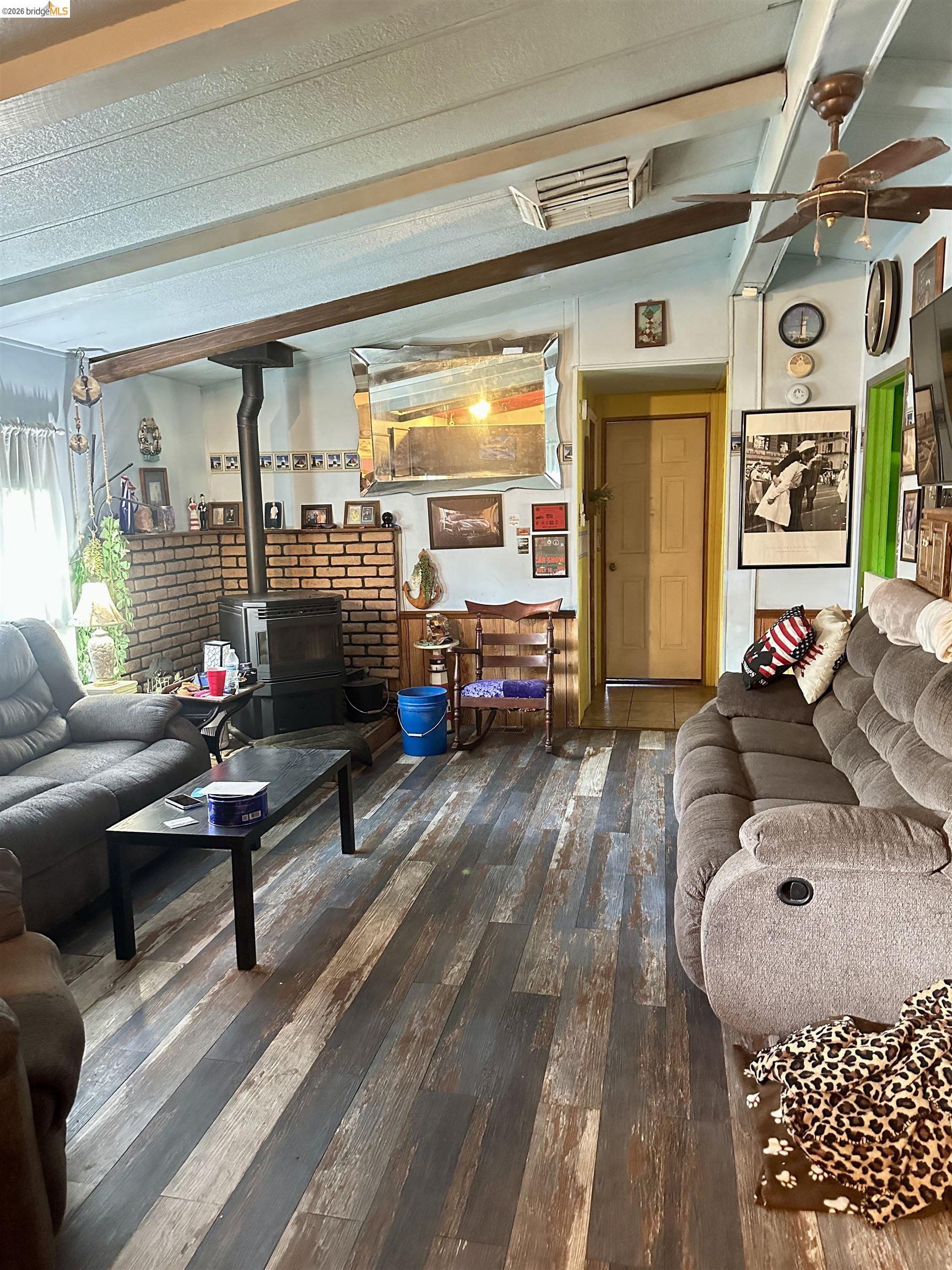 11761 Essen Lane Sonora, CA 95370 - Photo 9 of 20 a living room with furniture and wooden floor