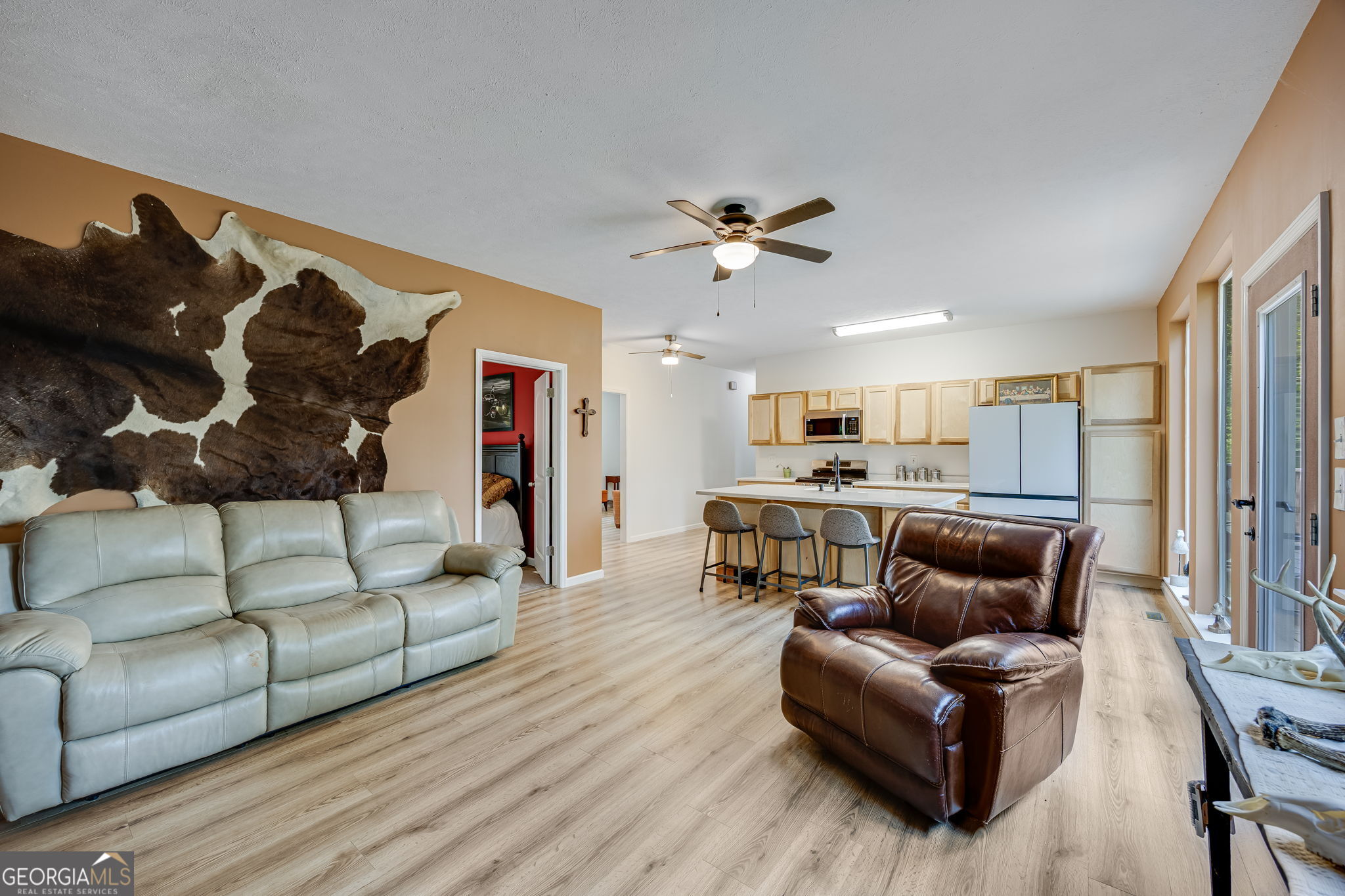3114 Lake Ranch Drive Gainesville, GA 30506 - Photo 17 of 58 a living room with furniture and wooden floor