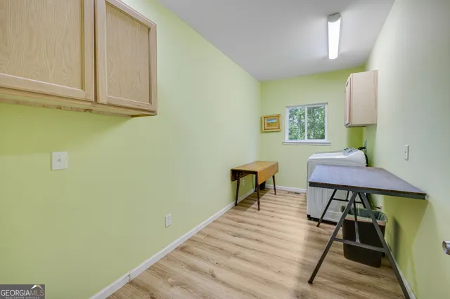 a view of a livingroom with furniture and furniture