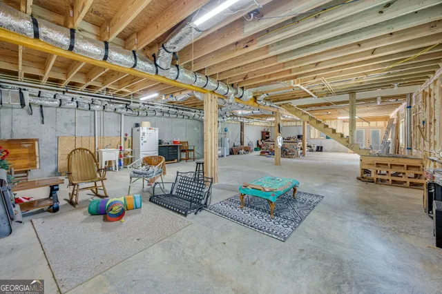 a view of a kitchen with a stove and a table