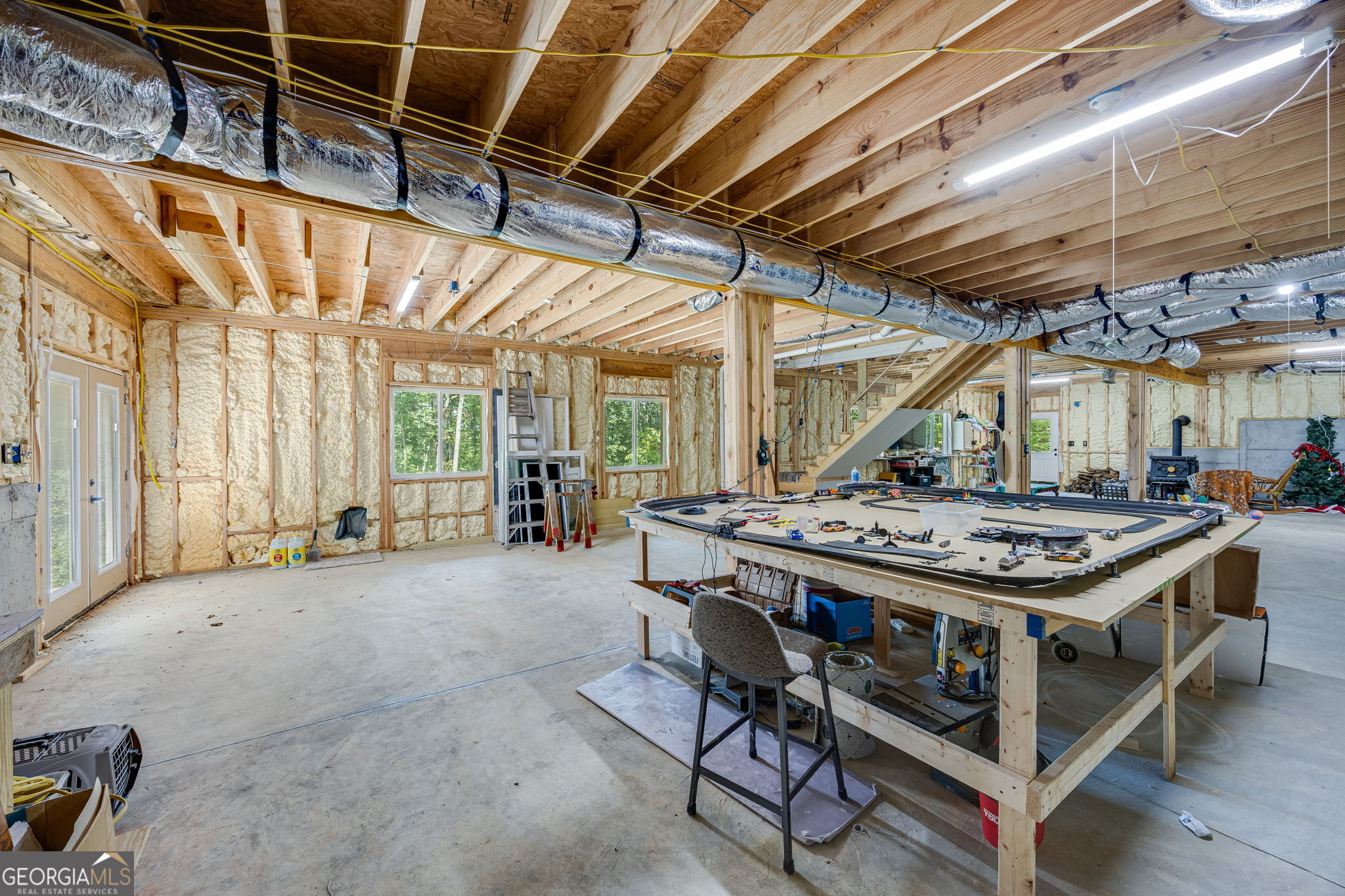 3114 Lake Ranch Drive Gainesville, GA 30506 - Photo 27 of 58 a view of a kitchen with a stove and a table