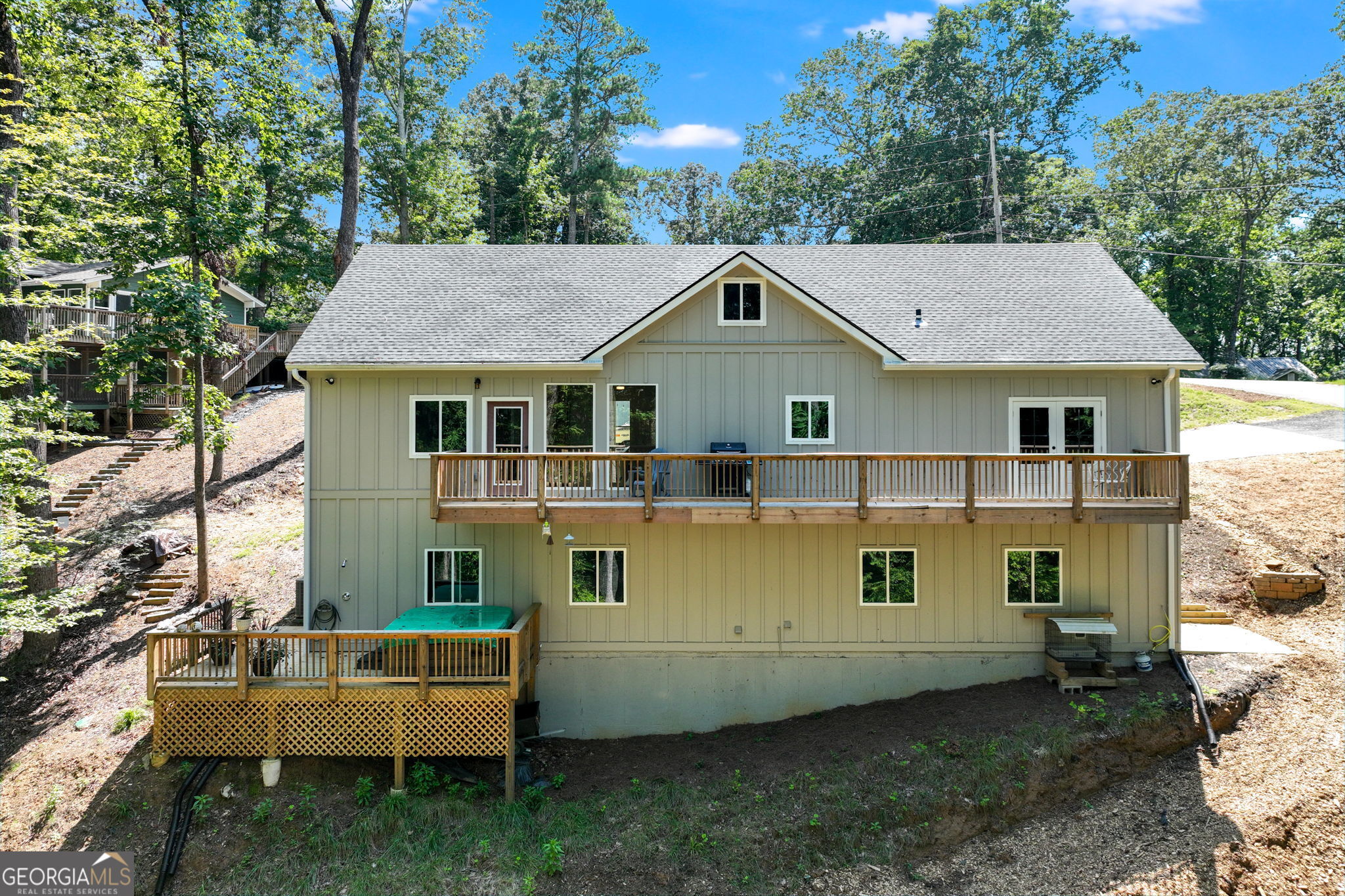 3114 Lake Ranch Drive Gainesville, GA 30506 - Photo 29 of 58 a view of a house with a yard