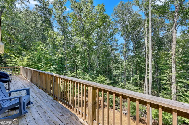 a view of balcony with trees