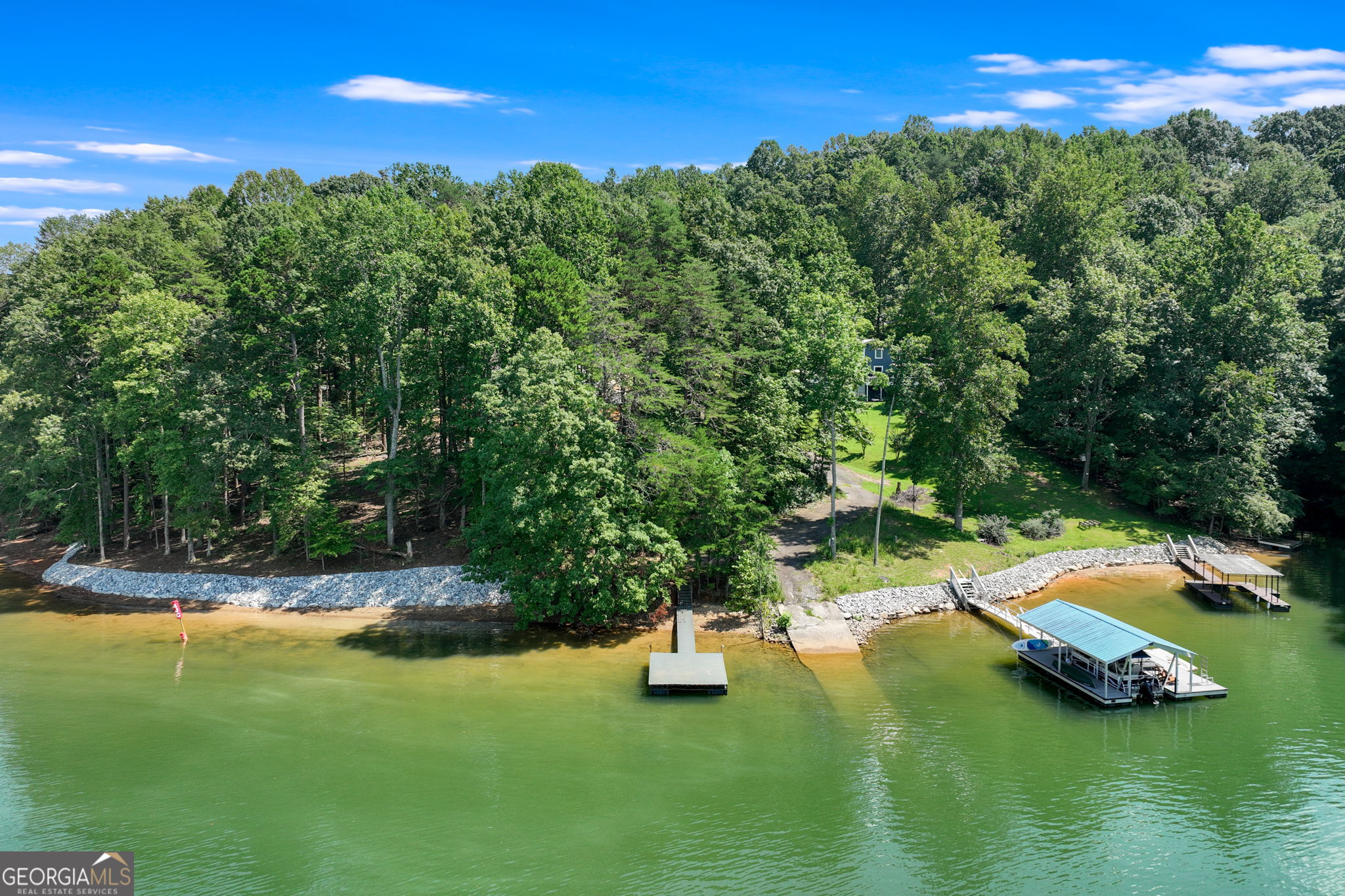 3114 Lake Ranch Drive Gainesville, GA 30506 - Photo 40 of 58 a view of a lake with houses