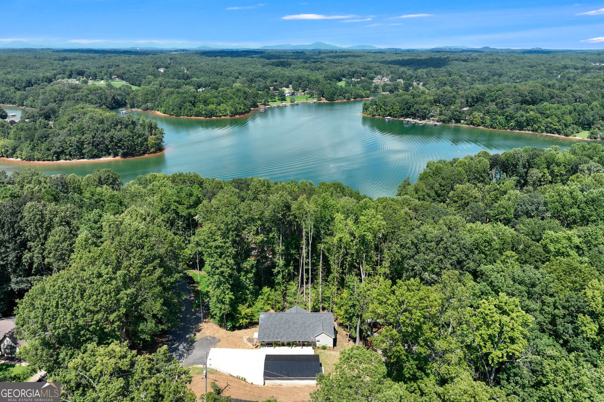 3114 Lake Ranch Drive Gainesville, GA 30506 - Photo 43 of 58 an aerial view of a house with a lake view