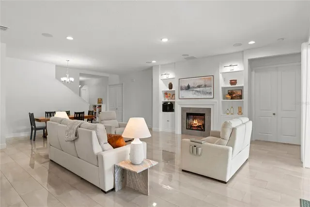 a living room with furniture and a table