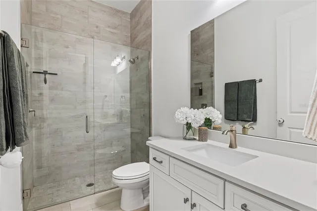 a living room with furniture pool table and window