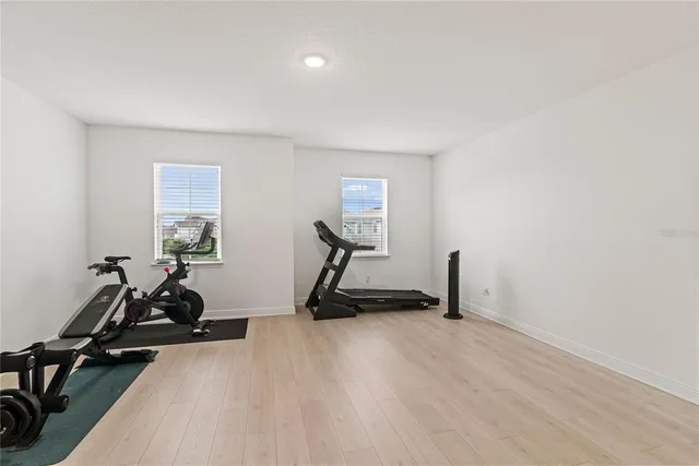 a view of swimming pool with outdoor seating