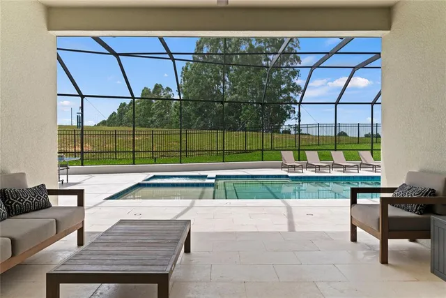 an aerial view of a house with a garden