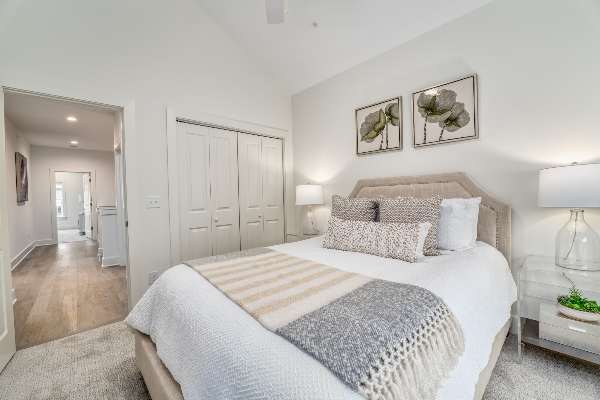 213 Ribbon Lane Franklin, TN 37064 - Photo 21 of 33 a bedroom with a bed and painting on the wall