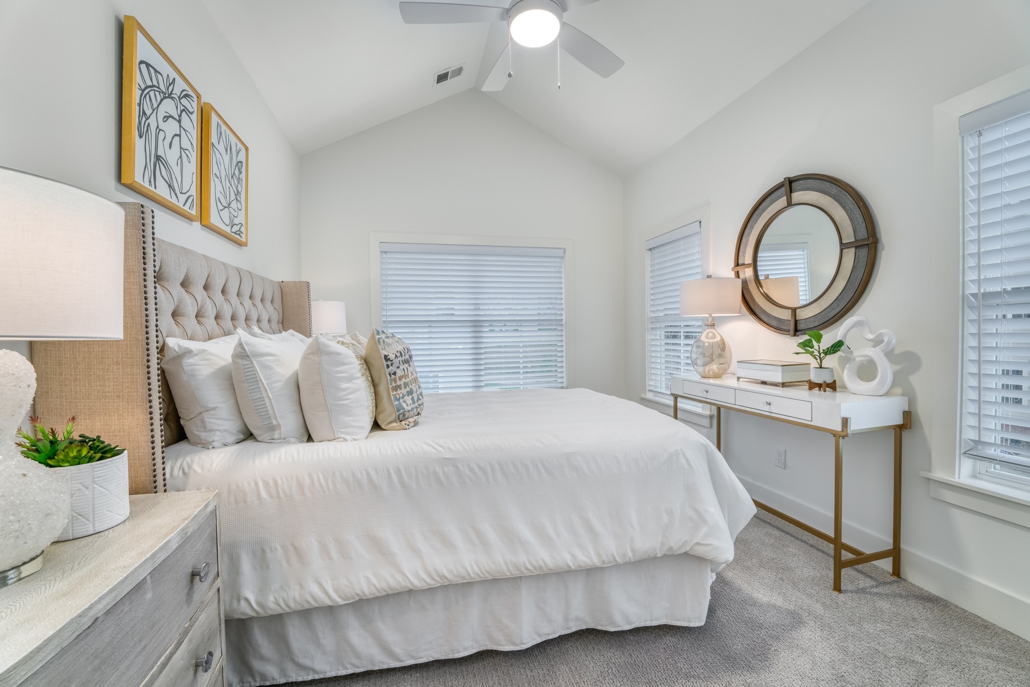 213 Ribbon Lane Franklin, TN 37064 - Photo 22 of 33 a bedroom with a bed a potted plant and a large window