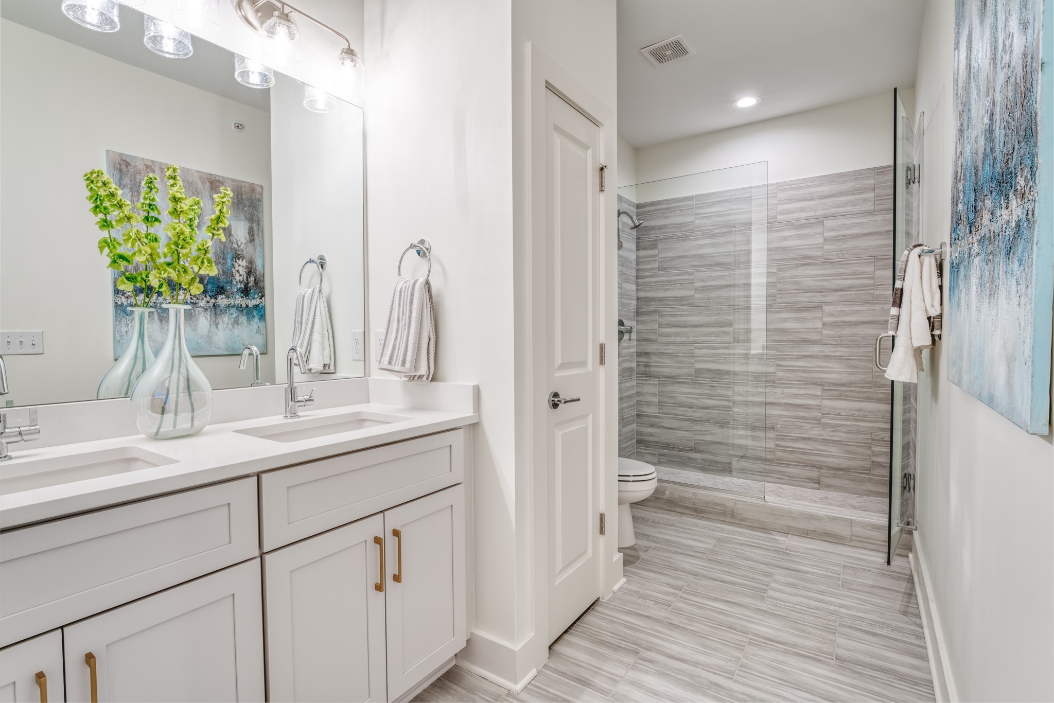 213 Ribbon Lane Franklin, TN 37064 - Photo 25 of 33 a bathroom with a shower sink and mirror