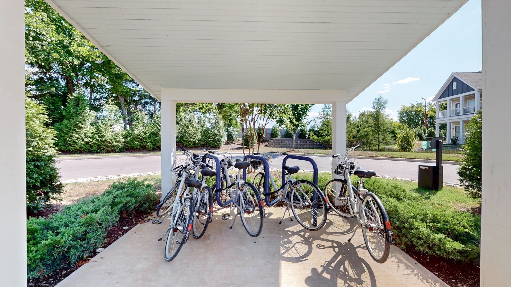 213 Ribbon Lane Franklin, TN 37064 - Photo 29 of 33 a view of a patio with lawn chairs potted plants and large tree
