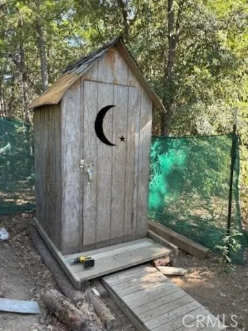 a view of a house with a snow on the ground