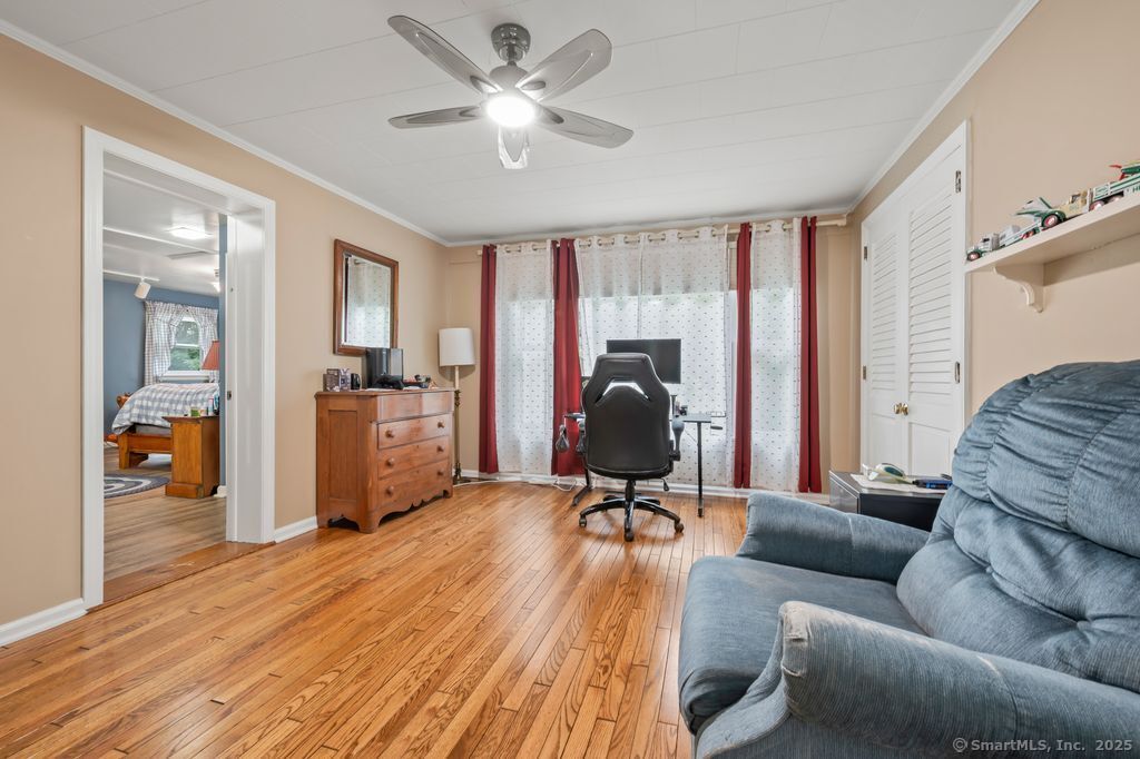 255 Dibble Hill Road Cornwall, CT 06796 - Photo 24 of 40 a view of a livingroom with workspace and a couch