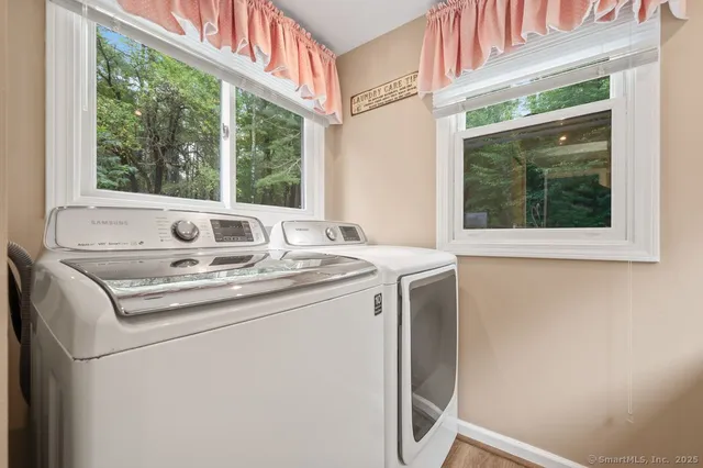 a bathroom with a sink and a window