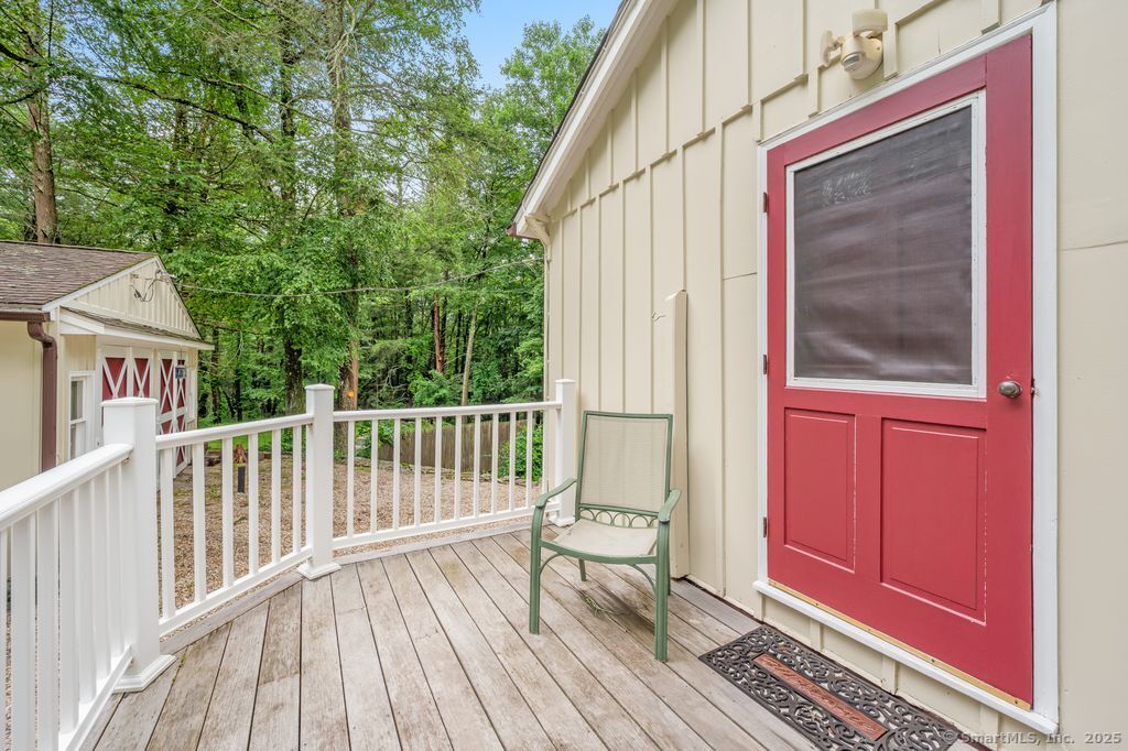 255 Dibble Hill Road Cornwall, CT 06796 - Photo 28 of 40 a view of deck with a flat screen tv and deck
