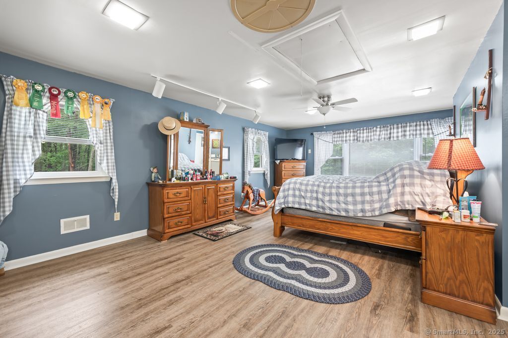 255 Dibble Hill Road Cornwall, CT 06796 - Photo 30 of 40 a bedroom with a bed and window