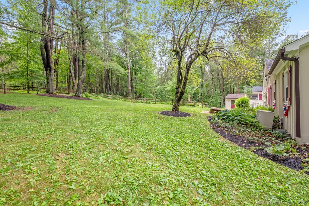 255 Dibble Hill Road Cornwall, CT 06796 - Photo 35 of 40 a view of a garden with a tree