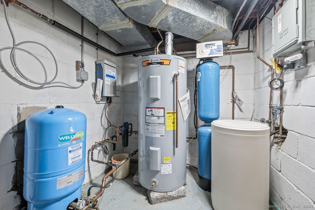 255 Dibble Hill Road Cornwall, CT 06796 - Photo 39 of 40 a utility room with dryer and washer