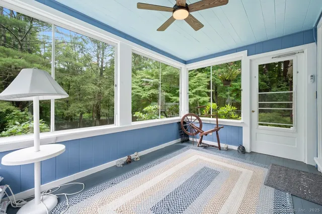 a house view with a sitting space garden view