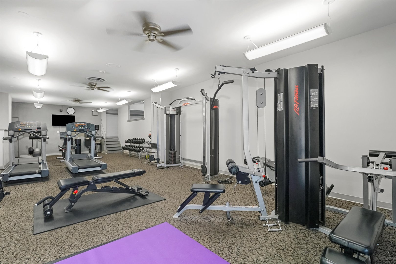 6301 North Sheridan Road, Unit 9A Chicago, IL 60660 - Photo 18 of 23 a view of a room with gym equipment