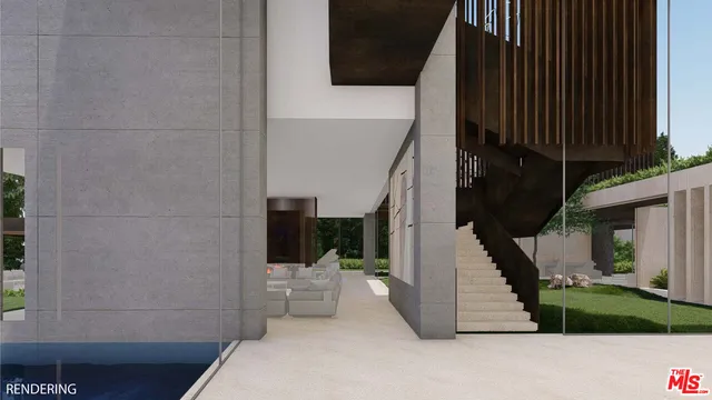 a living room with furniture a large window and a fireplace