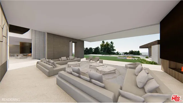 a front view of a house with a yard table and chairs