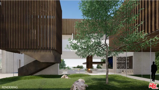 a front view of building with yard