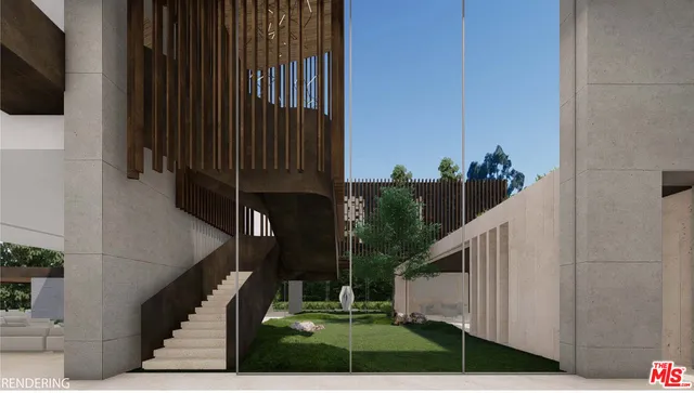 a bed sitting in a balcony next to a yard