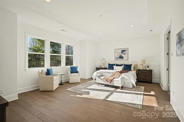 a bathroom with a sink mirror and toilet