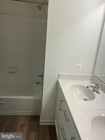 a bathroom with a sink and a vanity