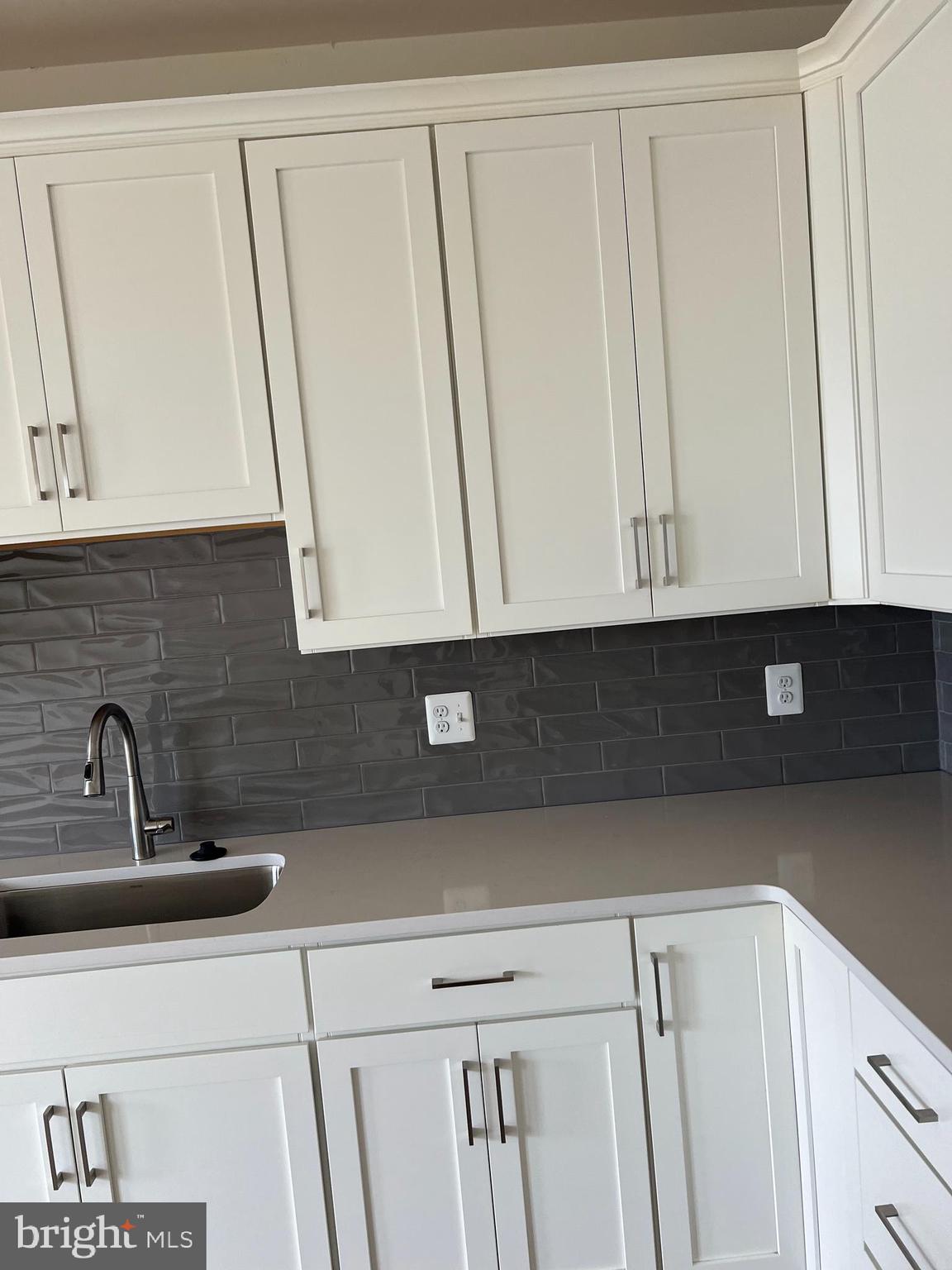 115 Clifton Manor Falling Waters, WV 25419 - Photo 24 of 29 a kitchen with a sink and cabinets