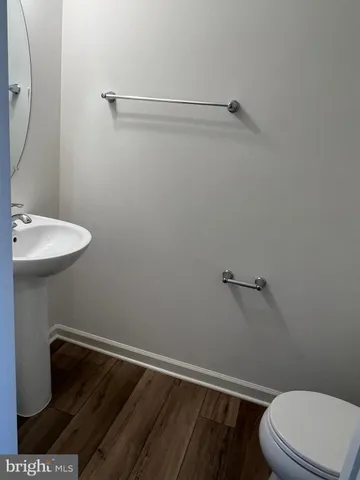 a bathroom with a sink toilet and vanity