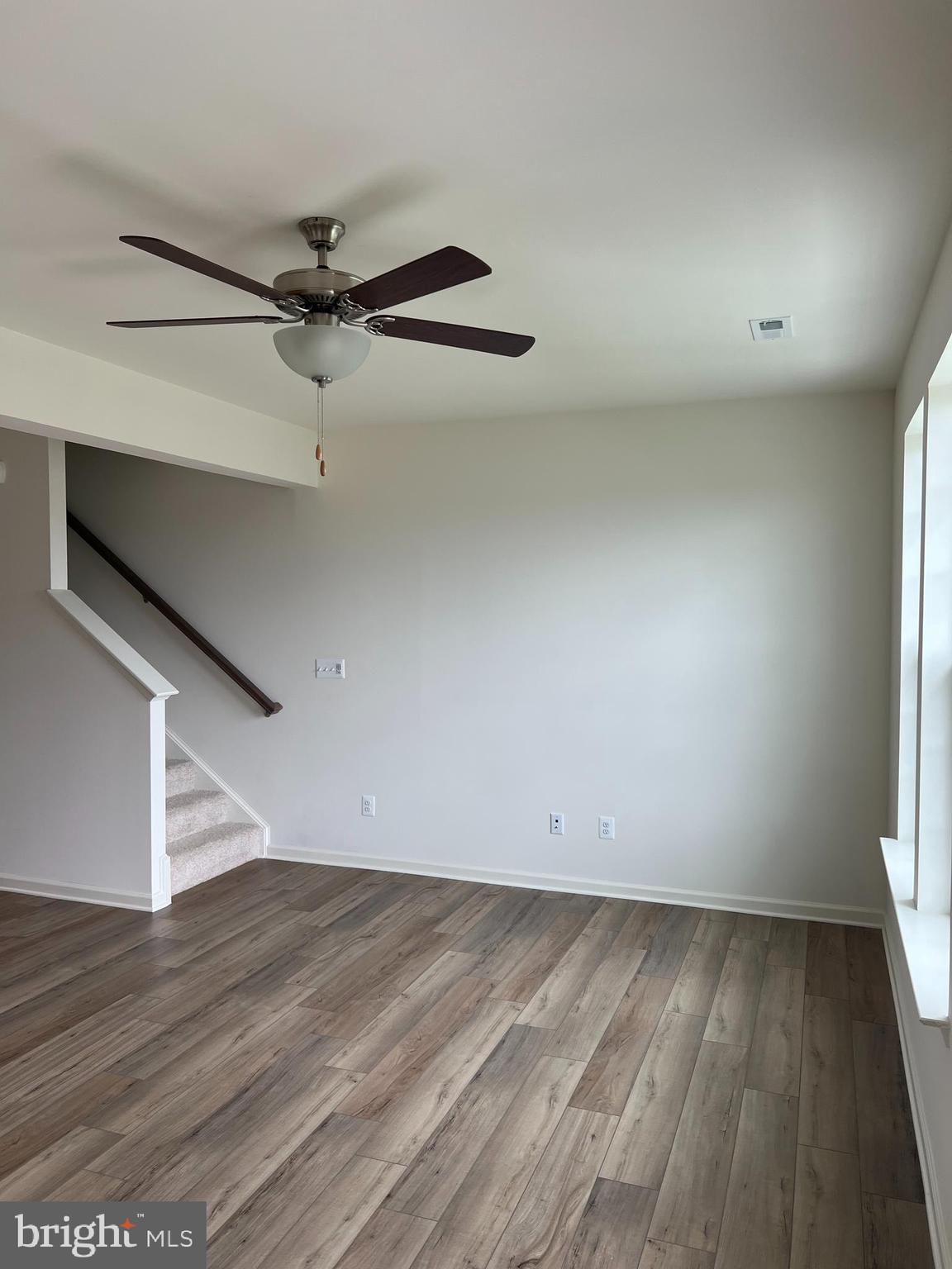 115 Clifton Manor Falling Waters, WV 25419 - Photo 5 of 29 wooden floor in an empty room