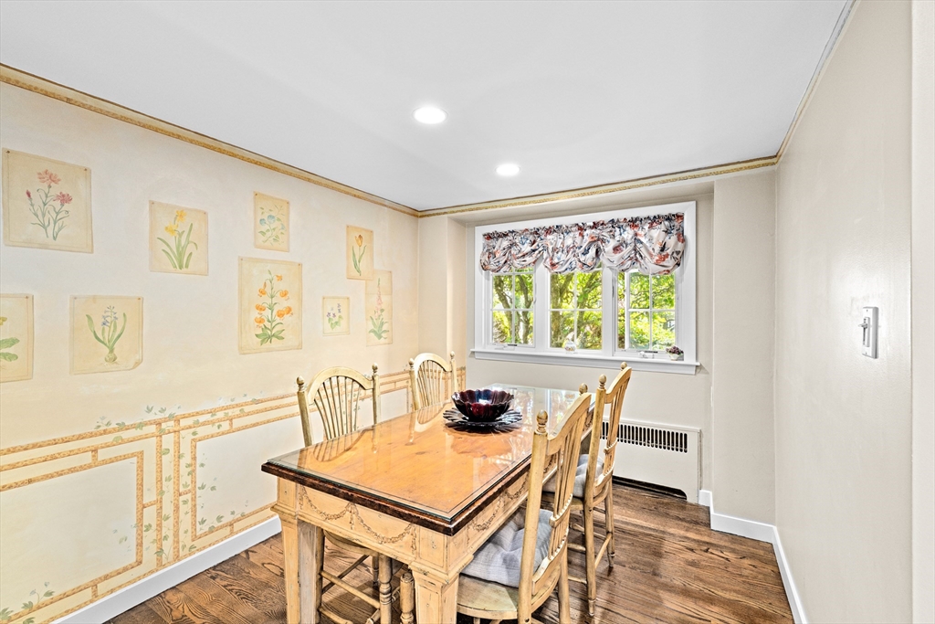 443 Chestnut Street Newton, MA 02468 - Photo 11 of 28 a view of a dining room with furniture window and wooden floor
