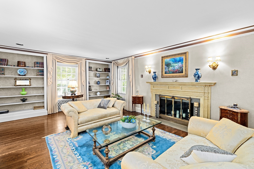 443 Chestnut Street Newton, MA 02468 - Photo 14 of 28 a living room with furniture fireplace and window