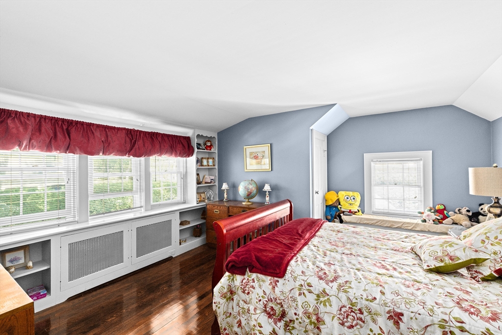 443 Chestnut Street Newton, MA 02468 - Photo 23 of 28 a bed room with a bed and a large window