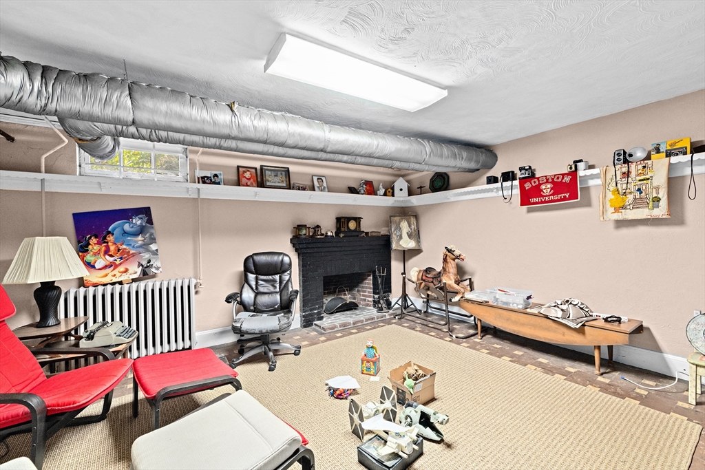 443 Chestnut Street Newton, MA 02468 - Photo 28 of 28 a bedroom with furniture toys and a chandelier