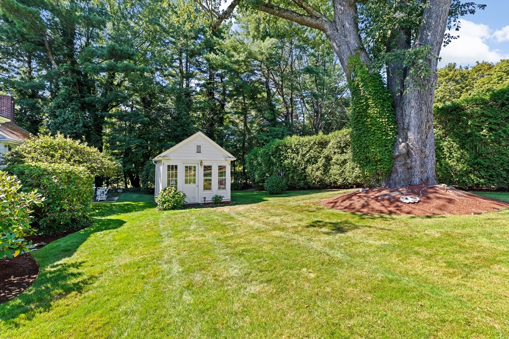 443 Chestnut Street Newton, MA 02468 - Photo 4 of 28 a swimming pool with wooden fence