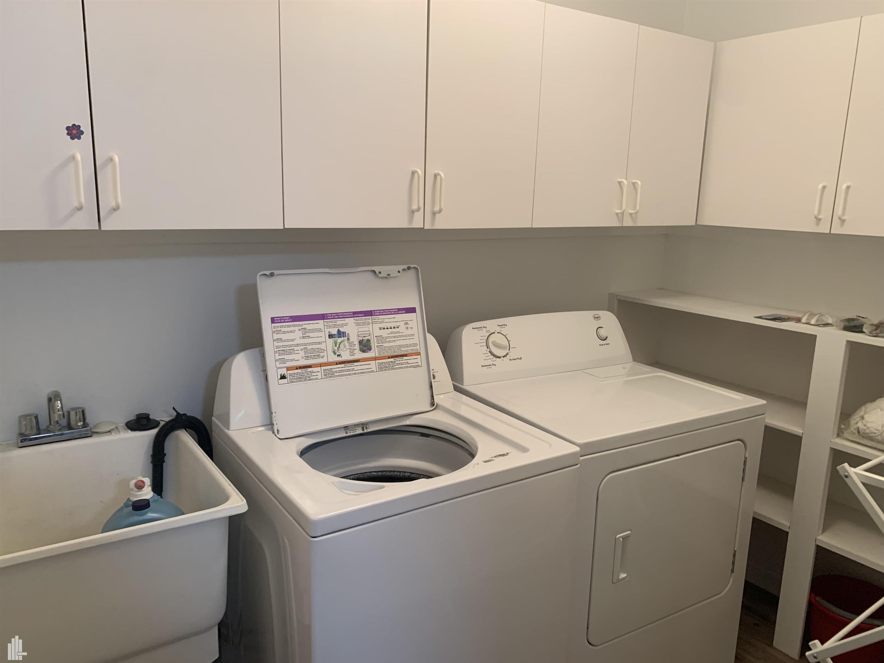 16740 Country Ridge Court Macomb, MI 48044 - Photo 18 of 30 First Floor Laundry