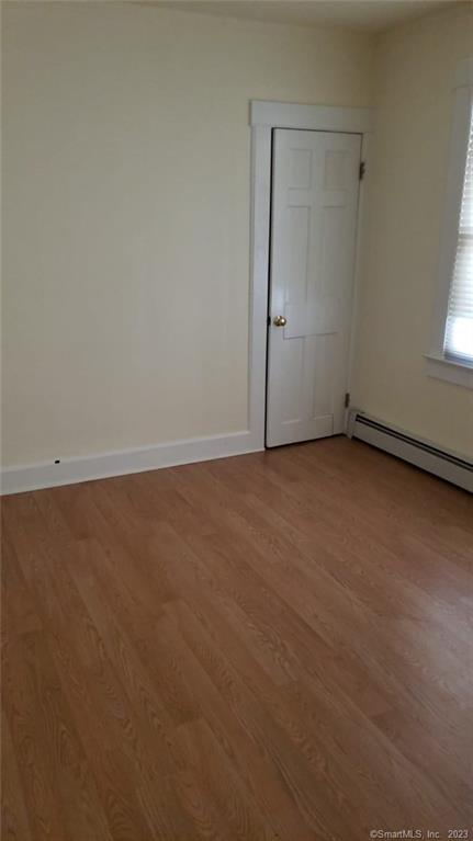 42 Weed Hill Avenue Stamford, CT 06907 - Photo 17 of 26 an empty room with a door