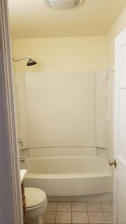 42 Weed Hill Avenue Stamford, CT 06907 - Photo 18 of 26 a bathroom with a granite countertop bathtub shower and toilet