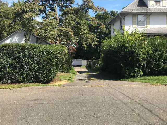 a car parked in front of a house