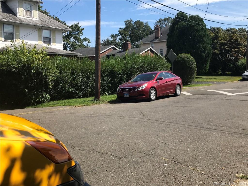 42 Weed Hill Avenue Stamford, CT 06907 - Photo 25 of 26 a car parked in front of a house