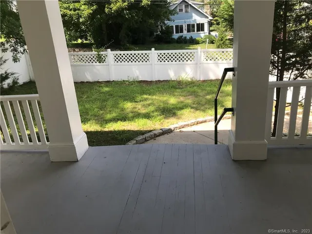 a view of a garden from a balcony