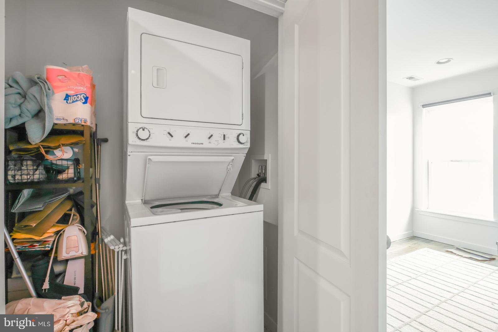 134 South 46th Street, Unit C Philadelphia, PA 19139 - Photo 12 of 17 a utility room with dryer and washer