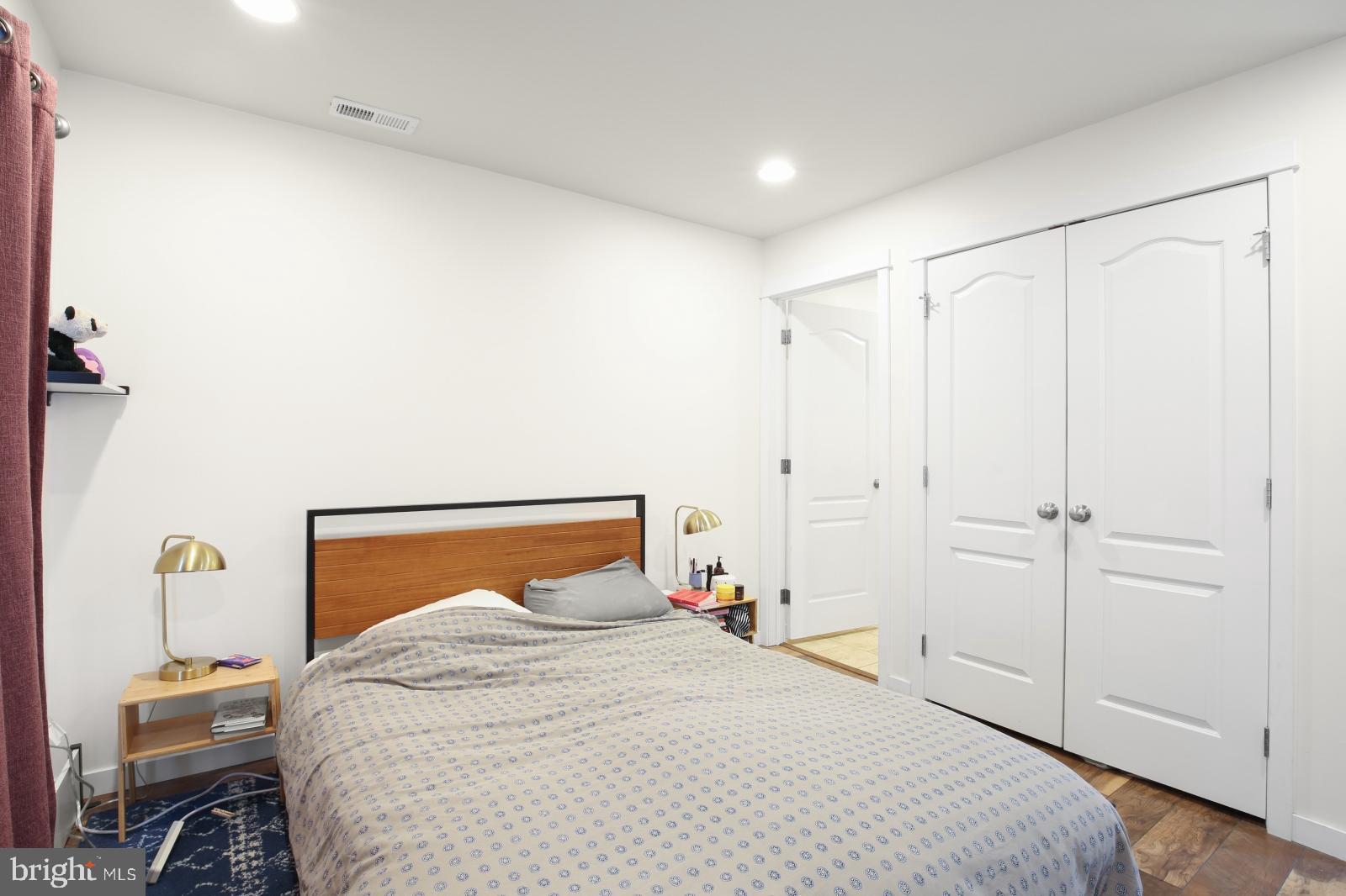 134 South 46th Street, Unit C Philadelphia, PA 19139 - Photo 14 of 17 a bedroom with a bed and a closet