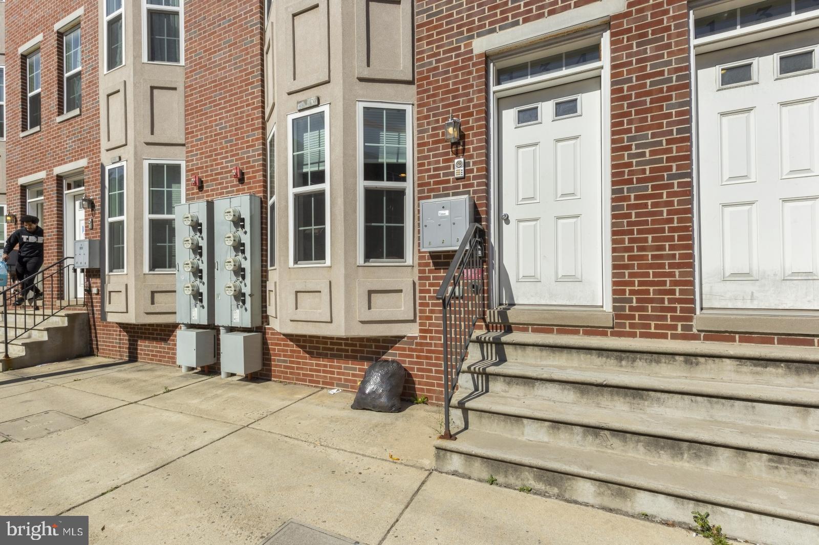 134 South 46th Street, Unit C Philadelphia, PA 19139 - Photo 16 of 17 a view of a brick building with many windows