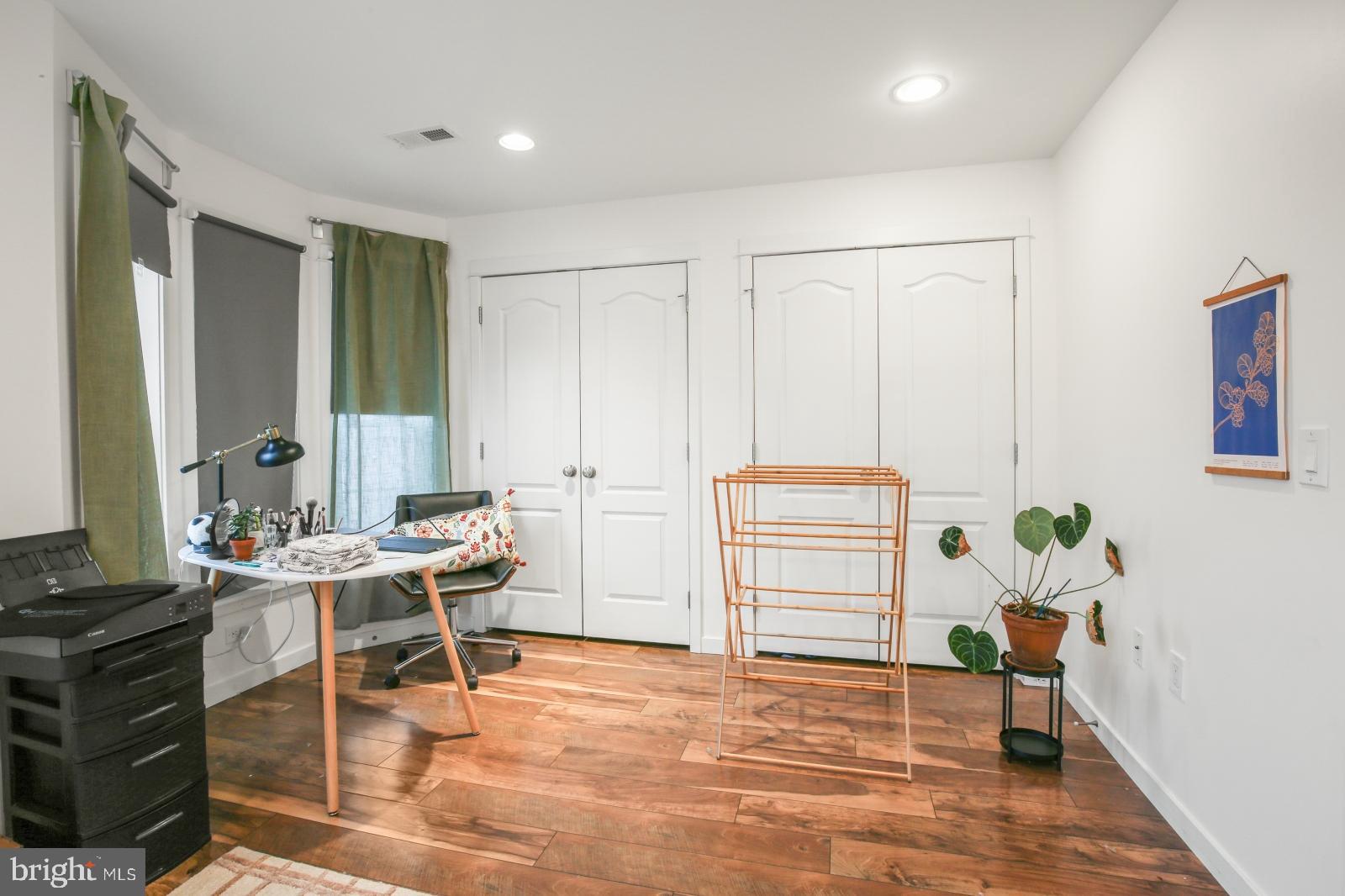 134 South 46th Street, Unit C Philadelphia, PA 19139 - Photo 8 of 17 a living room with furniture a rug and a window